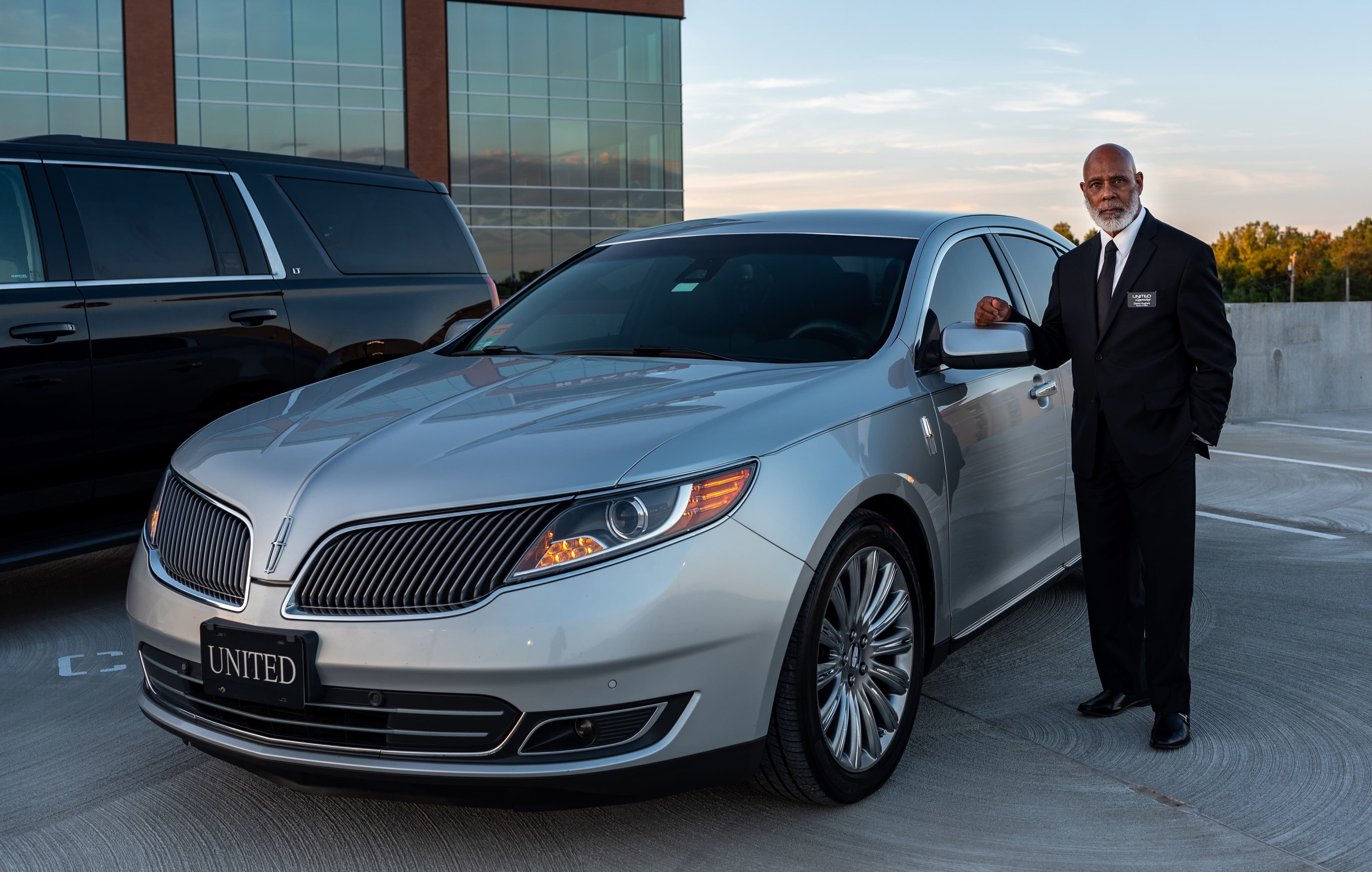 Professional chauffeur providing premium vehicle rental service in Kerala